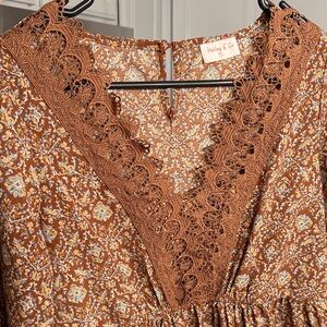 Elegant Brown Patterned V-Neck Blouse